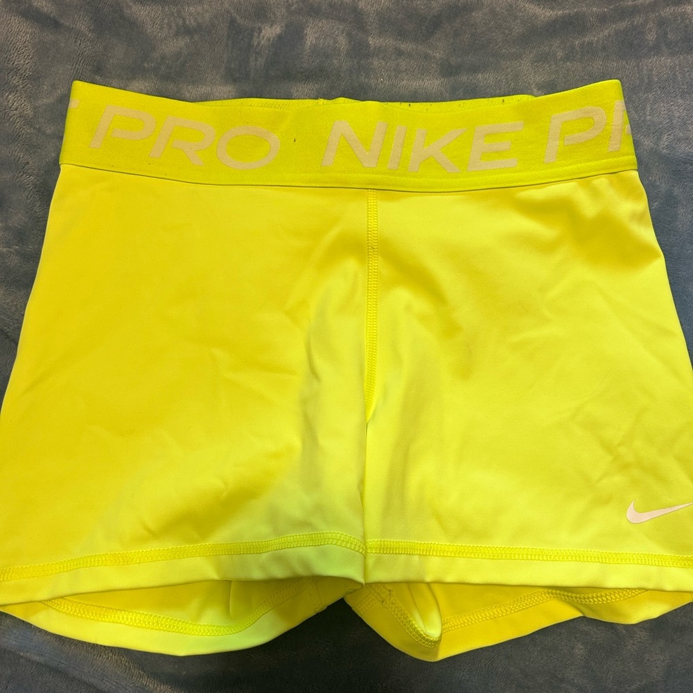 Neon yellow Nike pro medium